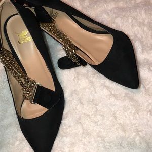 Black heels with gold ankle metal wrap